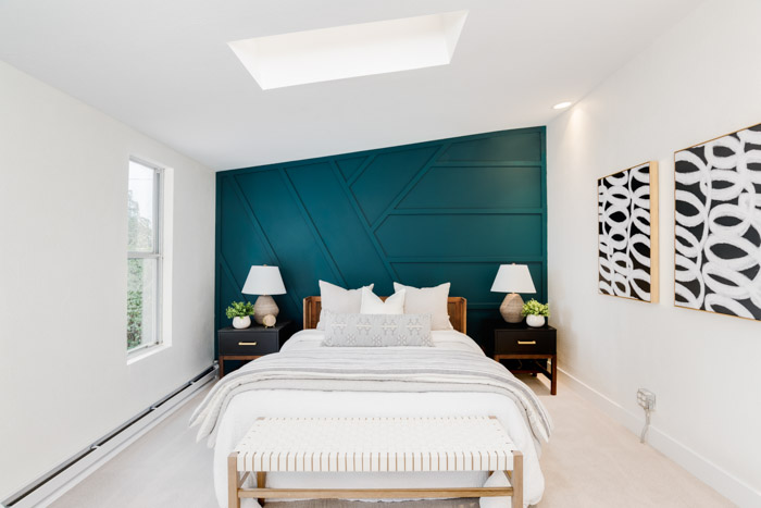 Mid century modern master bedroom with teal accent wall favorite stage